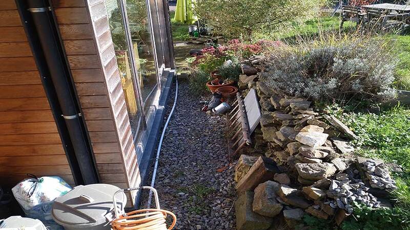 Aménagements extérieurs en gradin à Theux - région de liège. Accès ludique au jardin, potager intégré et assises conviviales. existant. Architecture raisonnée, ossature bois, écoconstructions extensions, transformations, nouvelles constructions Liège, Wallonie. Architecture durable économique et conviviale. Architecte situé à Liège